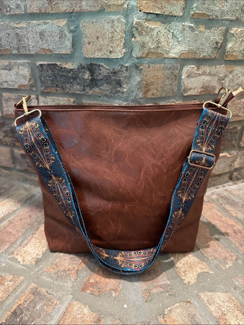 Women's Brown Faux Leather Crossbody Bag with Decorative Blue Strap